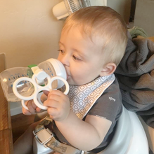 Load image into Gallery viewer, Baby drinking milk with Bottle Grabbies